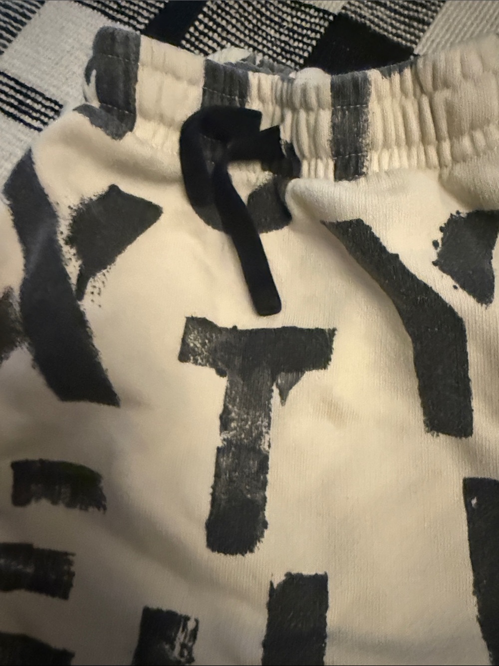 nununu Cream Shorts with Black Graphic Print - Picture 3 of 4
